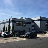 Lagerhalle der Firma Mentor in Erkrath gebaut von Schreiber Stahlbau mit horizontaler Thermowandfassade